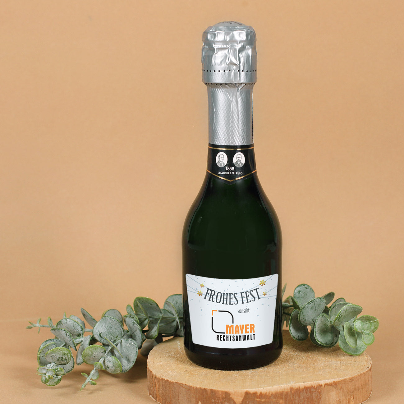 Kleine Sektflasche "Frohes Fest" mit Firmenlogo