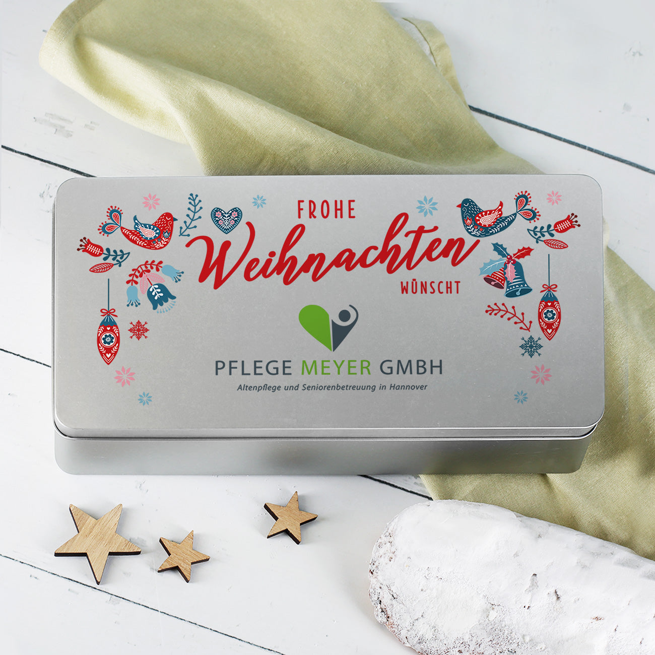 Stollendose "Frohe Weihnachten wünscht ..." Beispielbild Pflegedienst