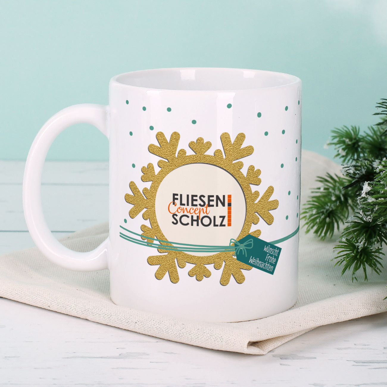 Geschenkset "große Schneeflocke" aus Tasse und Verpackung mit Logo