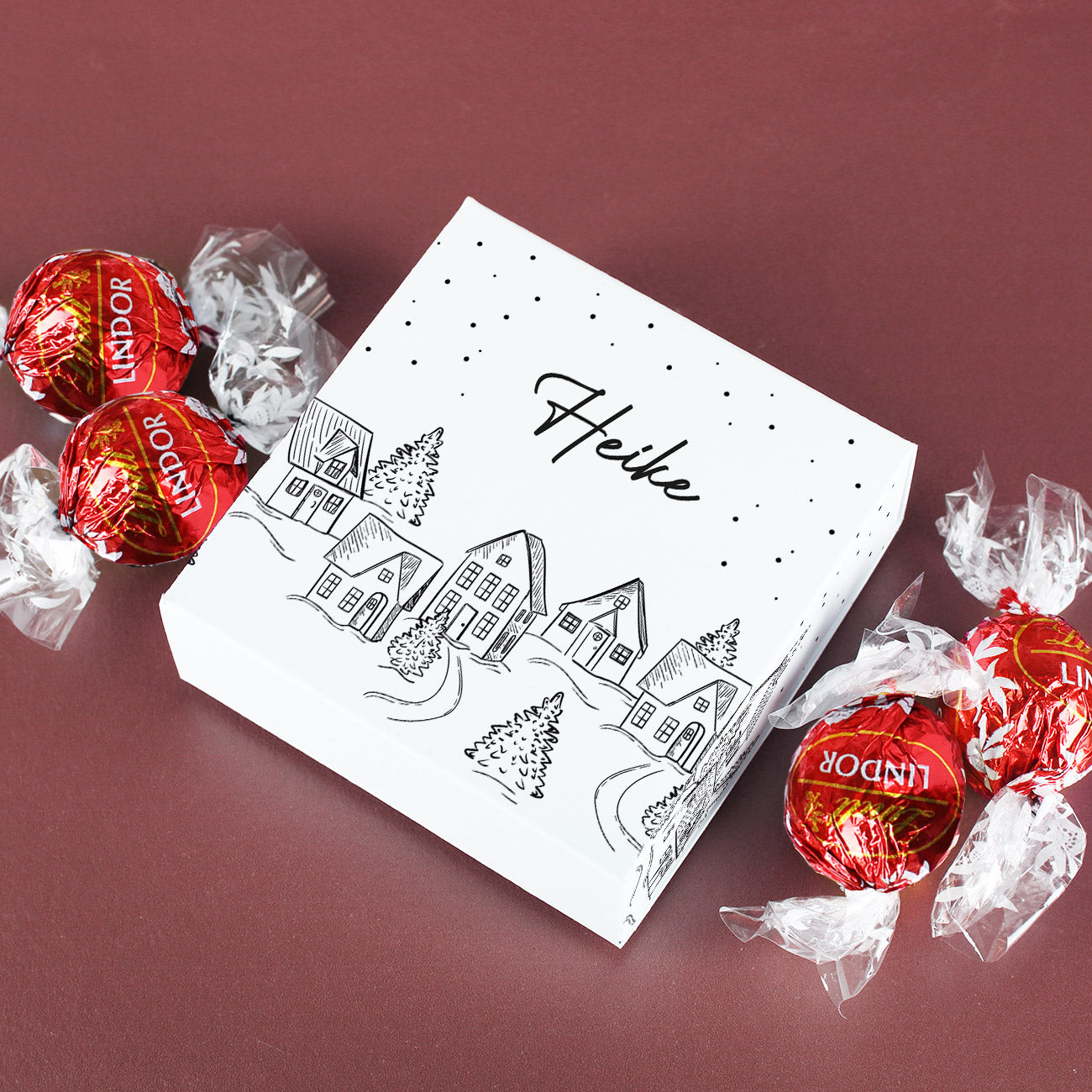 Weihnachtliche Verpackung mit 4 Lindor Pralinen