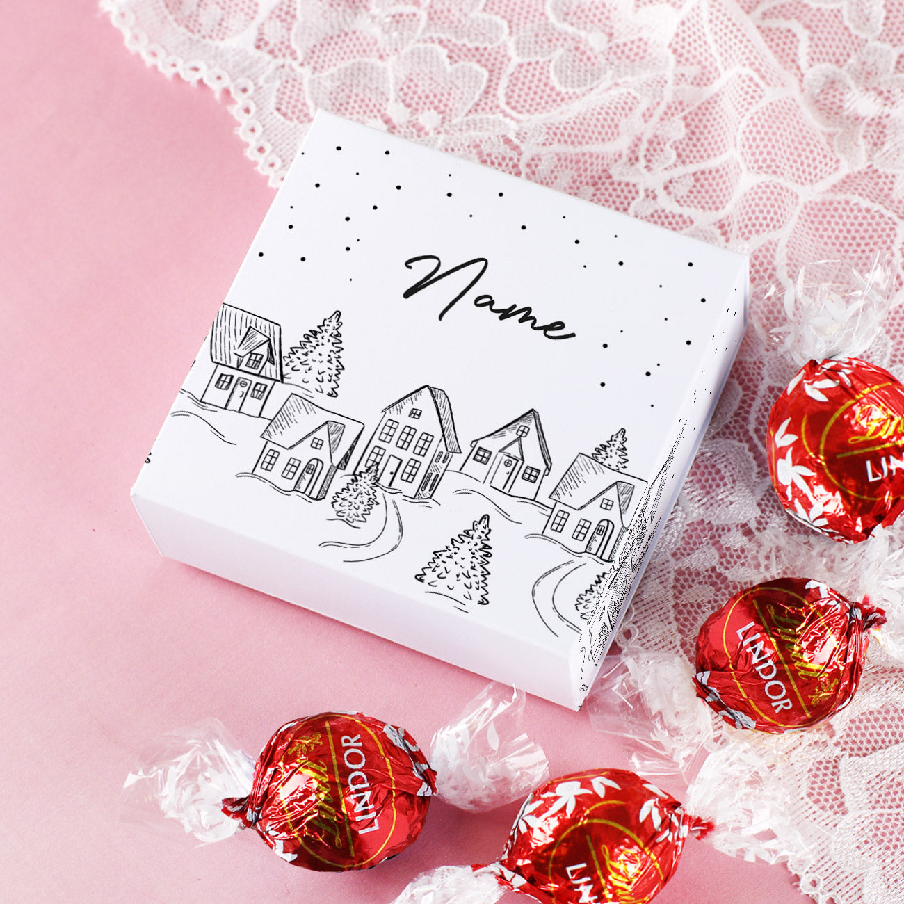 Weihnachtliche Verpackung mit 4 Lindor Pralinen