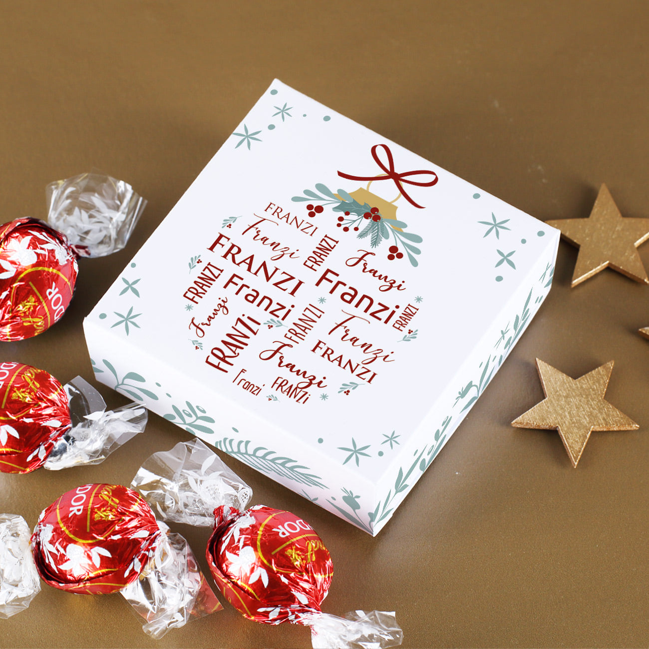 Weihnachtliche Verpackung mit 4 Lindor Pralinen