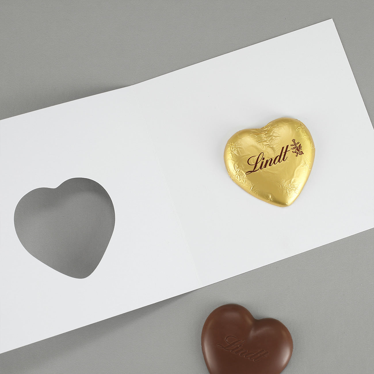 Klappkarte mit Lindt-Herz und Logo - Frohes Fest