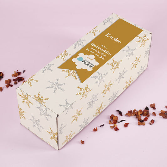 Geschenkverpackung mit Schneesternenmotiv, Firmenlogo und optional Name