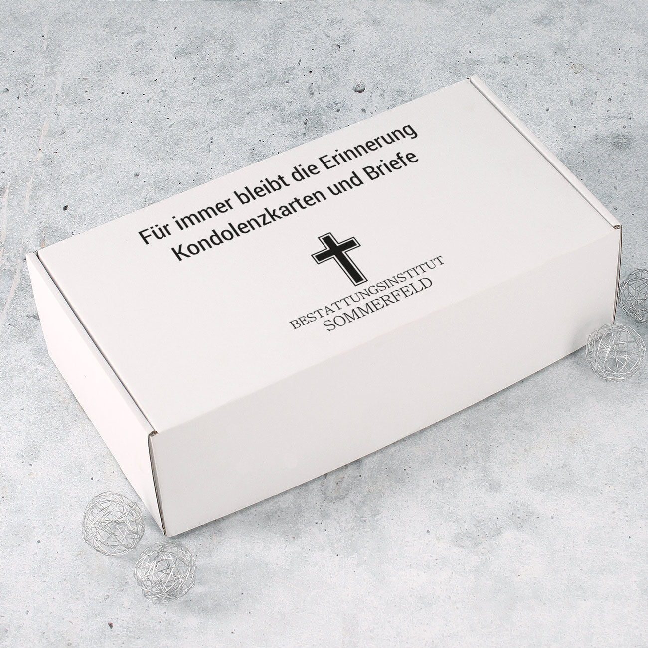 Übergabe-Box von Kondolenzbriefe mit Firmenlogo und Wunschtext