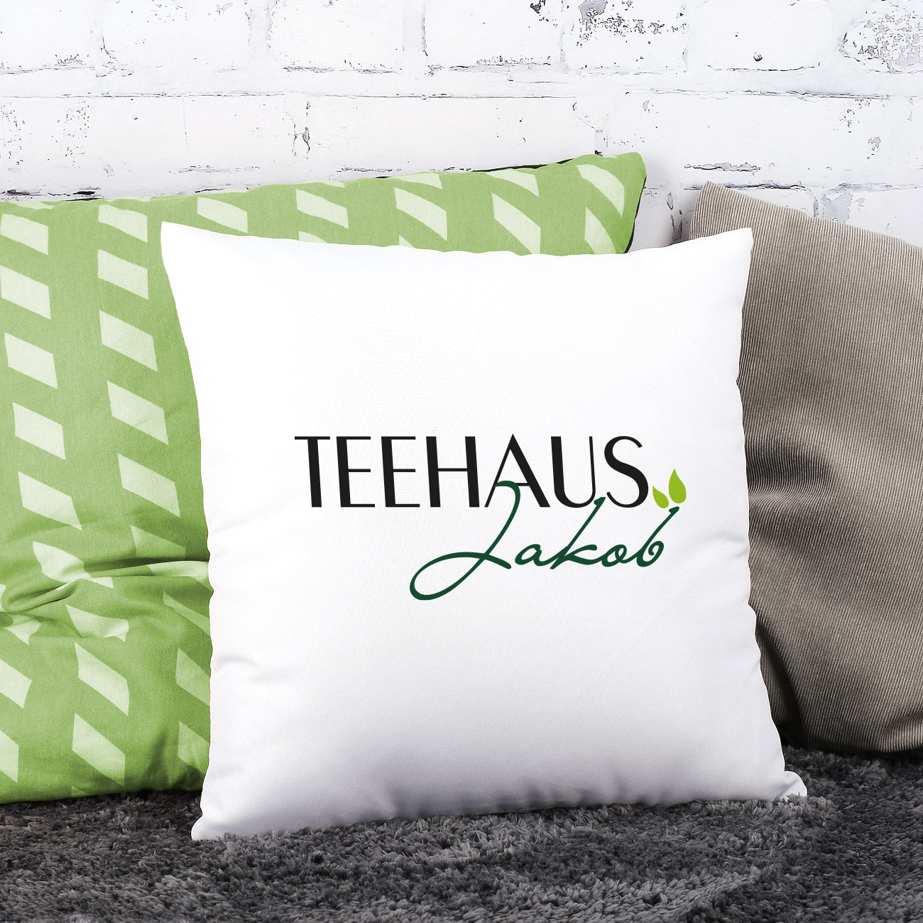 Kissen mit Logoaufdruck