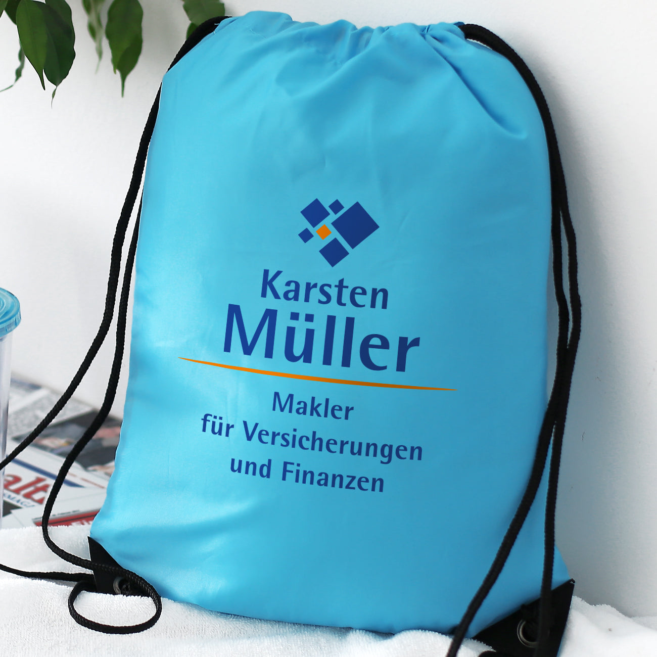 Bedruckter Turnbeutel mit Firmenlogo in versch. Farben