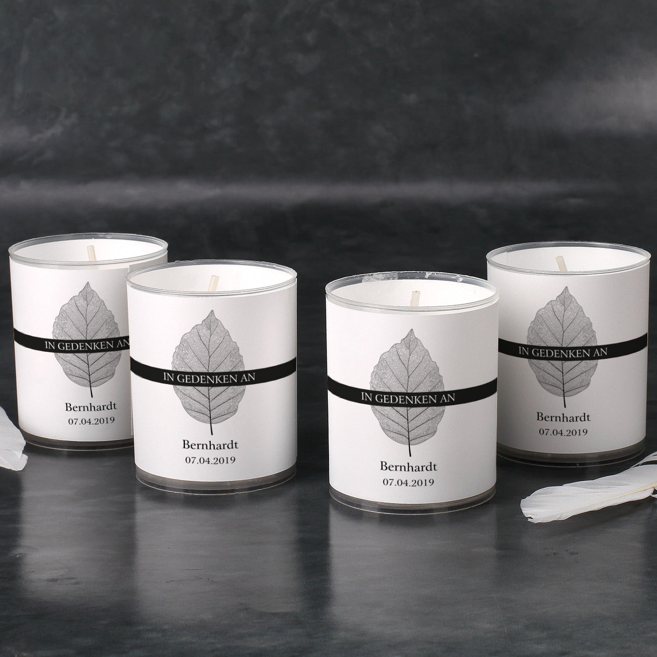 Trauerkerzen im 4er Set mit Namensdruck - In Gedenken an